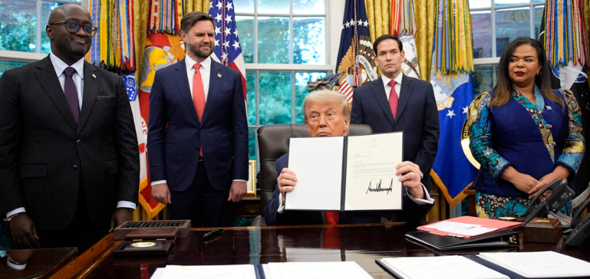 Donald Trump signing agreement